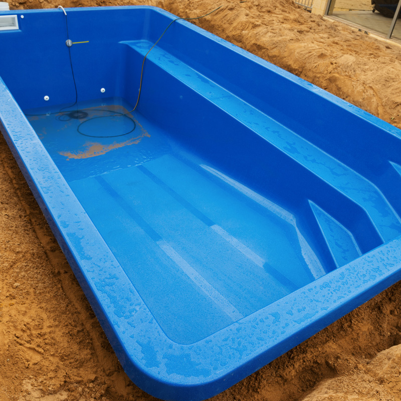 fiberglass pool in dirt